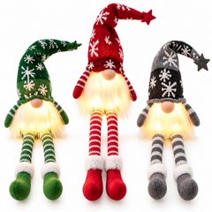 Trois lutins de Noël lumineux rouge vert et gris sur fond blanc