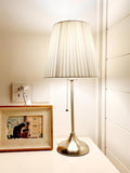 Lampe de chevet ikea noire et blanche a ++ with a sleek brushed nickel body and pleated white fabric shade