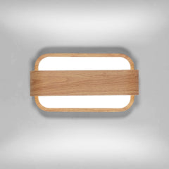 Applique murale LED asymétrique bande bois naturel centre surface lumineuse ovale sur fond gris neutre