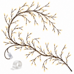 Branche lumineuse Willow Vine avec ses LED allumées présentée seule sur fond blanc